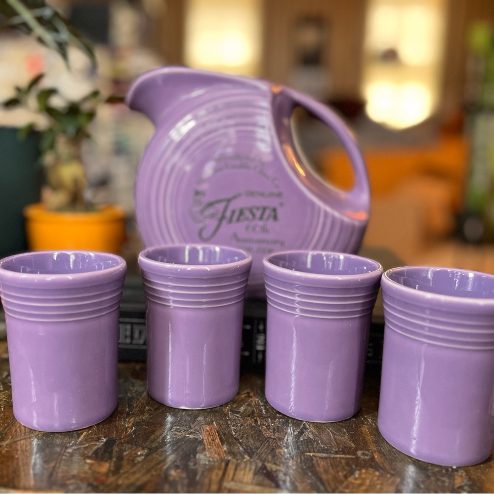 Fiesta ware 60th anniversary pitcher and cup set.